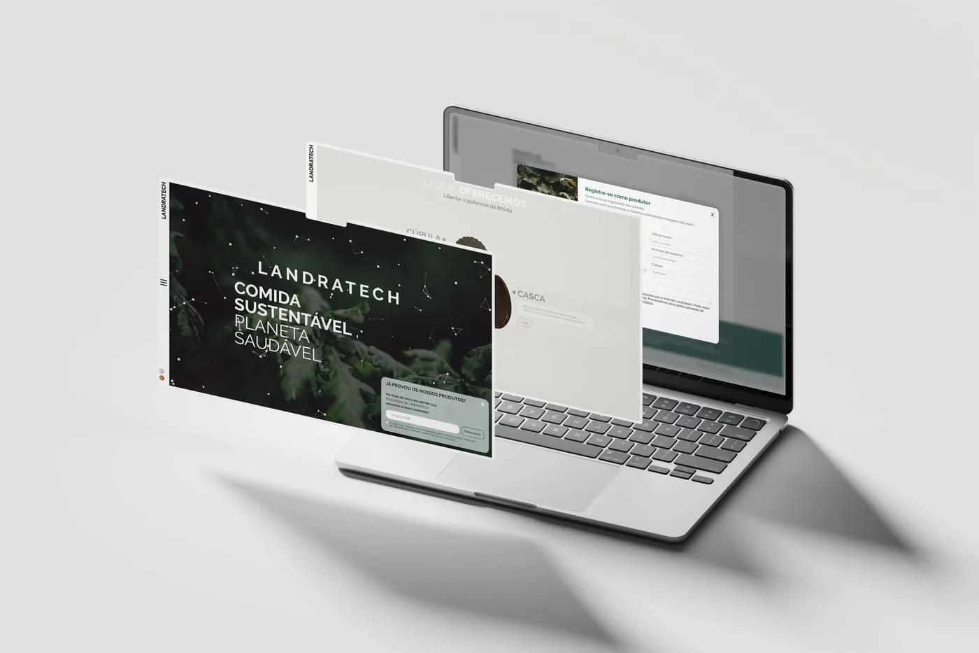 Interfaces da plataforma Landratech apresentadas num portátil